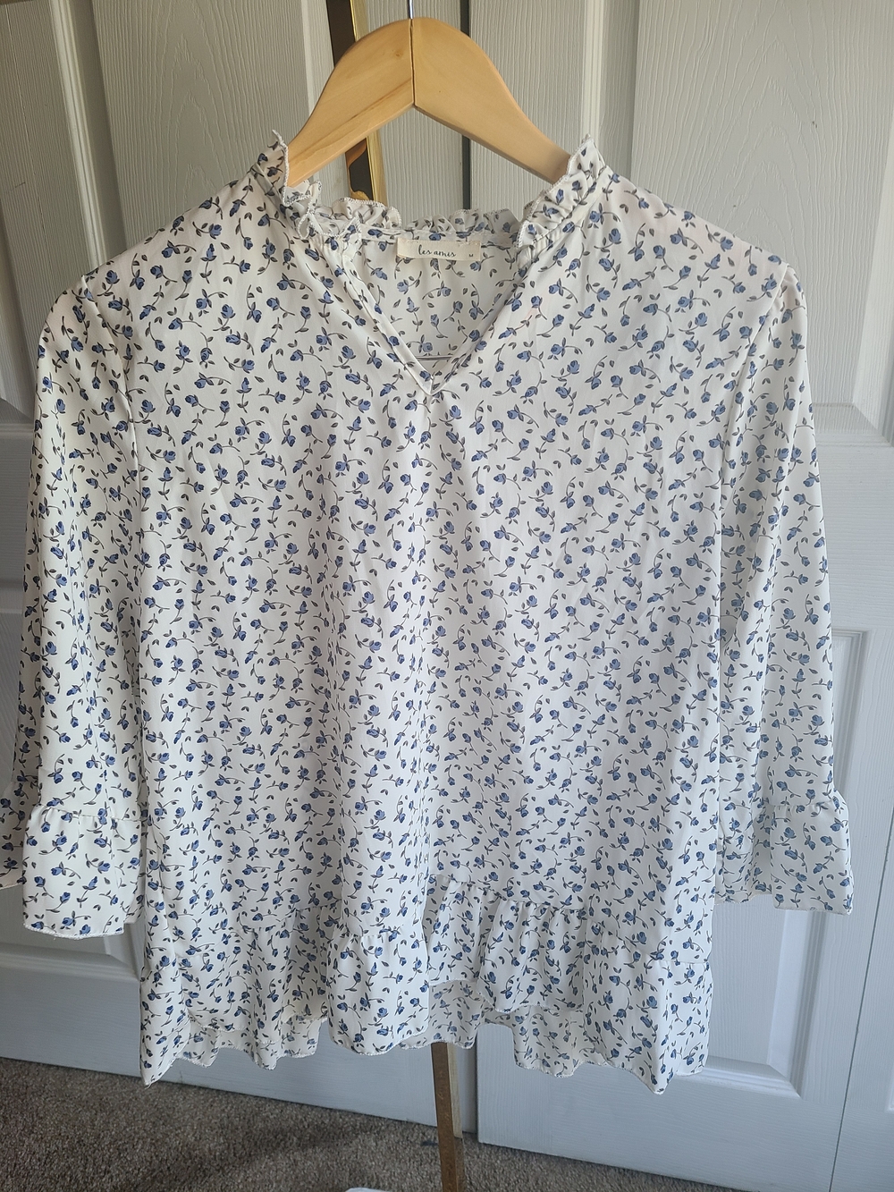 Women's White Blouse with Blue Floral Print and Ruffle Hem